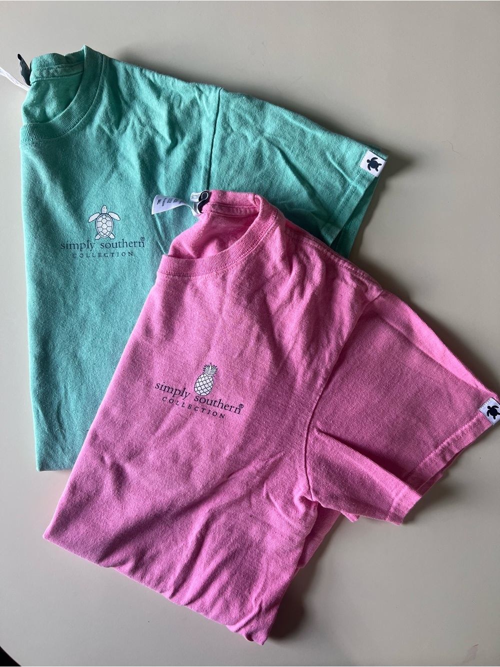 Simply Southern Women’s Short Sleeve Tees in Pink and Mint